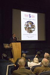 Rhidian Griffiths welcomign delegates to the National Library of Wales.