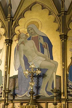 Detail of a painted reredos by A.R. Henderson.