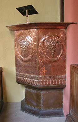 Pulpit in beaten copper by Henry Wilson.