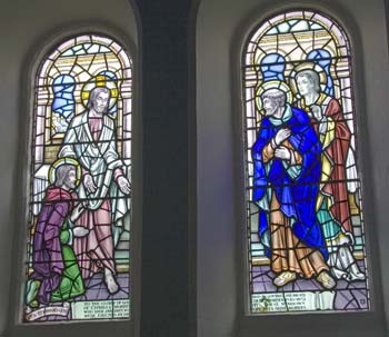 Two light window by Celtic Studios showing Jesus with three disciples.