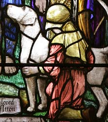 Detail of left lancet showing the foxhound.