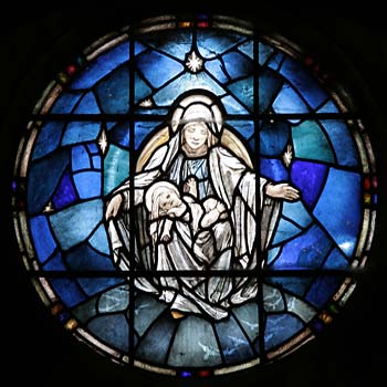 Central roundel showing the Virgin and Child.